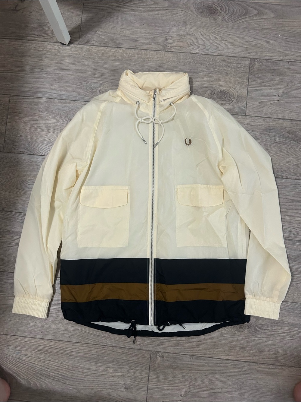 Fred Perry Cream Windbreaker with Black and Brown Colorblock Hem